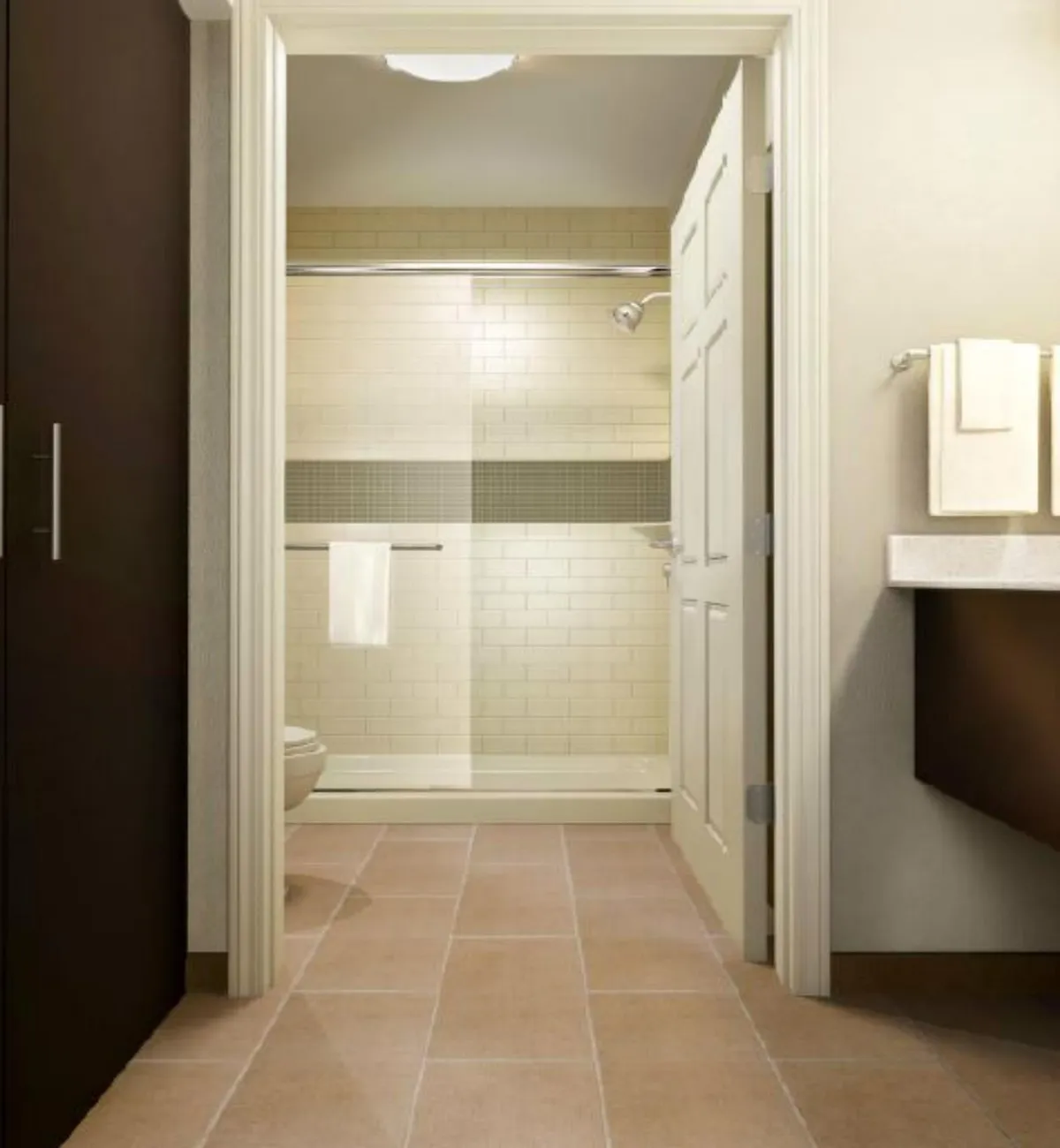 This image features a serene bathroom interior with a modern shower area, spacious sink and countertop, and neatly folded plush towels. The setting is bright and calm, showcasing amenities focused on personal grooming and relaxation, including complimentary toiletries and ample counter space.